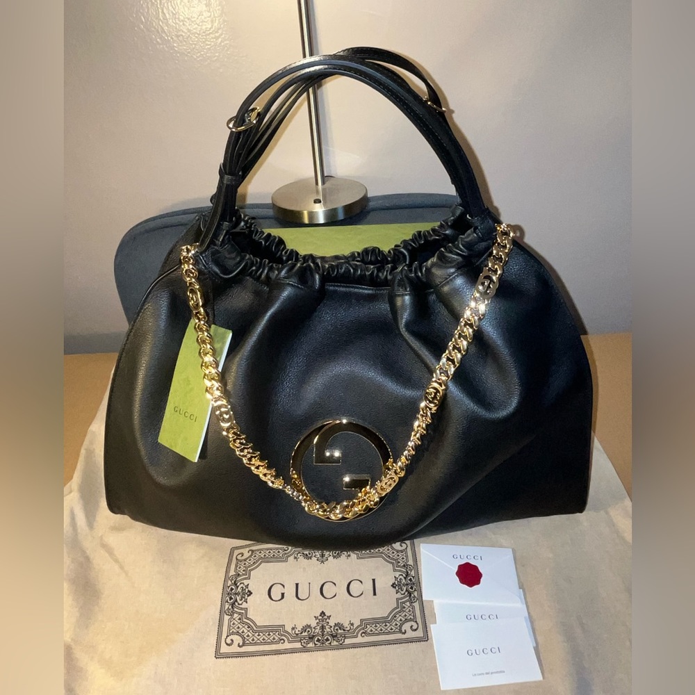 Gucci Black Leather Handbag with Gold Chain